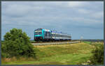 245 210-0 der DB Regio rollt am 02.07.2021 mit dem RE 6 über den Hindenburgdamm bei Morsum auf die Insel Sylt.