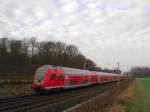 RE 21412 Hamburg Hbf - Lbeck Hbf fhrt kurz nach der Ausfahrt aus Reinfeld (Holst.) Richtung Zielbahnhof Lbeck.