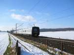 DSB IC 3 5085 rast mit 140 km/h als EC 35 Hamburg Hbf - Kopenhagen bei Reinfeld (Holst.) durch die winterliche Landschaft.