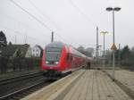 RE 21420 Hamburg Hbf - Lbeck Hbf rast am 21.02.09 mit rund 140 km/h durch Hamburg-Wandsbek Richtung Bad Oldesloe.