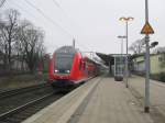 RE 21422 rast am 21.02.09 mit 140 km/h durch Hamburg-Wandsbek Richtung Bad Oldesloe.