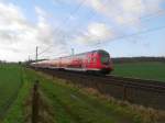 RE 21419 Lbeck Hbf - Hamburg Hbf kurz nach der Ausfahrt aus Reinfeld (Holst.) am 19.12.08.