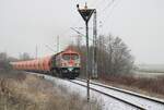 HVLE V330.8 (250 009) kam mit einem vollen Getreidezug auf der Fahrt von Dresden, am Morgen des 10.12.2021 in Mukran an.