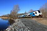 Die ODEG ausfahrend aus dem Bahnhof von Lietzow, als RE 9 (76359 Stralsund Hbf - Ostseebad Binz) mit Tfz 4746 303/803 (Taufname:  Hansestadt Stralsund ) (26.02.2022).
