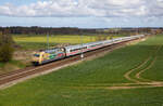 101 088 am 26.04.2023 mit dem IC2213 Ostseebad Binz - Köln Hbf, bei Bergen (Rügen).
