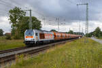 HVLE Voith Maxima 40CC V490.2, 264 012 kam am 26.07.2022 mit einer langen Leine Getreide, hier zu sehen durch Teschenhagen, weiter nach Mukran gefahren.