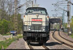 203 166-4 (202 412-3 | 112 412-2 | 110 412-4 | DR V 100.1) dieselt allein durch den Hp Magdeburg Herrenkrug auf Gleis 1 Richtung Biederitz.
Tele-Schuss vom Bahnsteigende.

🧰 STRABAG Rail GmbH (STRABAG SE)
🕓 2.5.2022 | 12:48 Uhr
