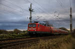 DB 112 115 am 07.11.2022 mit ihrem RE3 nach Stralsund. Aufgenommen am Abzw. Srg.