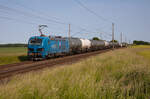 NRAIL 192 018 zieht am 04.06.2023 für LEG einen Kesselzug durch Groß Kiesow.
