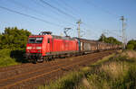 DB Cargo 145 002 mit einem Papierzug am 13.06.2023 in Stralsund.
