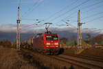 DB Cargo 145 076 mit Kesselzug am 29.12.2022 in Herzsprung.