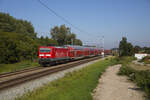 Am 08.09.2023 zog die 143 242 den RE3 3309 Stralsund - Luckenwalde durch Andershof.