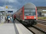 RE 18314 Elsterwerda-Stralsund beim Halt in Z�ssow am 23.Juni 2012.