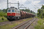 232 141 mit Schotter für das Streckengleis Grimmen - Demmin. Aufgenommen am 29.05.2022 im Bahnhof Elmenhorst.