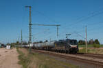 187 100-3 Beacon Rail (ex MRCE) mit einem Kesselwagenzug auf der Fahrt in Richtung Neustrelitz/Berlin am 27.04.2025 in Kavelstorf.