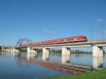 RegionalExpress nach Cottbus, hier auf der Eisenbahnbrcke Torgau.