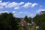 Blick am 22.06.2012 vom B�nischplatz auf dem Kamenzer Stadttunnel in das Bahnhofsgel�nde. Ich h�tte mir gew�nscht, dass zum Zeitpunkt der Aufnahme ein Zug auf dem Bahnsteiggleis vorhanden w�re, aber leider war w�hrend meines, nur kurzen, Aufenthaltes in der Stadt, keiner zu erwischen! Auch wenn es sich hier nur um einen kleinen Bahnhof einer Nebenbahnstrecke handelt, war hier zu Reichsbahnzeiten immer allerhand los!