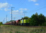 275 109-2 fährt mit einem Schotterzug durch Berlin Wuhlheide gen Süden.