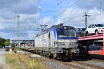 370 025-6 alias 193 513 zieht einen leeren Autozug durch Saarmund in Richtung Genshagener Heide.

Saarmund 28.09.2024