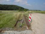 Derzeitiges Gleisende der ehemaligen Bahnstrecke Guben - Forst (Lausitz), heute Industrieanschlussgleis.