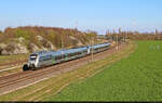1442 109 und 1442 202 (Bombardier Talent 2) bremsen ab für ihren nächsten Halt Schkeuditz West.