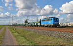 140 833-5 (140 050-3) zieht leere Autotransportwagen der ARS Altmann AG bei Benndorf (Kabelsketal) Richtung Schkeuditz.