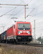 187 180 zog am 12.02.2024 einen gemischten G�terzug richtung Hannover, fotografiert in Dedensen
