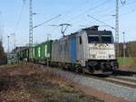 LINEAS 186 182 mit gemischtem Güterzug aus den Niederlanden in Rheine=Bentlage, 12.02.2022