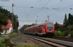 RB 24521 (Bremen-Vegesack-Verden(Aller)) mit Schublok 143 958-7 in Langwedel 17.8.10