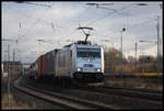 386037-6 kam am 10.12.2018 um 10.34 Uhr auf der Rollbahn um 10.34 Uhr mit einem Container Zug am Haken durch den Bahnhof Hasbergen und war in Richtung Ruhrgebiet unterwegs.