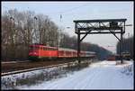 110448 erreicht hier mit dem Regionalzug auf der Fahrt nach Münster am 5.3.2005 den Bahnhof Natrup Hagen.