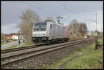 Unmittelbar vor dem nachfolgenden AKE Rheingold kam am 29.3.2023 um 16.47 Uhr die Railpool 185699-7 Lz auf der Rollbahn durch Hasbergen.