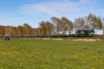 272 407-8 mit Flachwagen bei Bramstedt nach Osnabr�ck.
