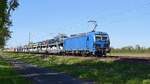 RRL 192 082 (91 80 6192 082-6), vermietet an dispo-Tf Rail, mit Autotransportzug in Richtung Osnabr�ck (bei Lembruch, 30.04.2026).