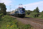 110350-6 von Patrick Geselbracht hat gerade den Lengericher Tunnel durchfahren und ist hier am 29.08.2026 um 11.04 Uhr in Lengerich-Schollbruch mit dem DZ 74201 unterwegs nach Bremen.