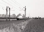 DB 103 127-7 mit E-2326 (Hagen Hbf - Amsterdam CS) bei Formsignal  A  bei Praest, 30.03.1977, Bild 90974.