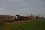 212 376-8 der Aggerbahn fährt mit einem Bauzug auf ihrer Fahrt von Paderborn-Nord nach Recklinghausen-Süd durch Hamm-Neustadt (12.12.2022)