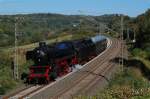 Auf dem Rckweg von den verkehrshistorischen Tagen in Gera nach Oberhausen ist hier 41 360 mit Doppeltender und Begleitwagen bei Altenbeken gen Paderborn unterwegs, 01.10.2012.