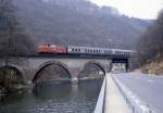 212 308 auf der Volmebrücke bei Schalksmühle am 10.04.1986.