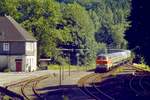 218 146 mit Sonderzug Neuenrade - Hamm am 04.07.1988 in Binolen