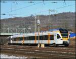 Nun d�rfen sie fahren...hat ja lang genug gedauert... ET7.01 und ein RRX ET7 sind als ERB92350 (RE13  Maas-Wupper-Express ) von Hamm(Westf) nach M�nchengladbach Hbf unterwegs. (07.03.2010)