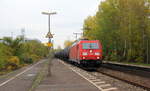 185 403-3 von DB  Green Cargo  kommt mit einem Ölzug aus Antwerpen-Petrol(B) nach Basel(CH) und kommt aus Richtung Köln-Gremberg und fährt durch Bonn-Oberkassel in Richtung Koblenz. Aufgenommen vom Bahnsteig von Bonn-Oberkassel an der rechten Rheinstrecke. 
Am Nachmittag vom 2.11.2018. 