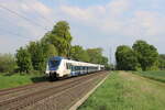 National Express 9 442 360 fährt am 02.05.2022 als RB48 nach Wuppertal-Oberbarmen durch Bornheim auf der linken Rheinstrecke nördlich von Bonn.