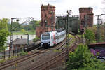 DB 429 119 (SÜWEX) passiert die Mainzer Südbrücke auf seiner Fahrt als RE2 von Frankfurt (M) Hbf nach Koblenz Hbf. (05.05.2023)