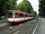 Eine Doppeltraktion aus Stadtbahnwagen B der dritten Generation der KVB bei der Ausfahrt aus der Haltestelle  Marienburg  in K�ln als Zug der Linie 16 (Rheinuferbahn) nach Niehl am 14.06.2004.