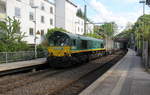 Die Class 66 266 031-4 von Railtraxx kommt mit viel Dieselpower aus Richtung Köln,Aachen-Hbf und fährt durch Aachen-Schanz mit einem Containerzug aus Köln-Eifeltor(D) nach Genk-Haven(B)