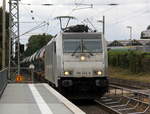 186 424-8 von Lineas/Railpool kommt die Kohlscheider-Rampe hoch aus Richtung Mönchengladbach,Herzogenrath mit einem Kalkleerzug aus Oberhausen-West(D) nach Hermalle-Huy(B) und fährt durch