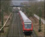 RE 10422 mit Zuglok 111 151 bei der Einfahrt in bach-Palenberg 7.3.2009