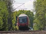 RE10423 mit Schublok 111 116 nach Dortmund kurz vor dem Bahnhof Geilenkirche, Gre an den Tf, 19.5.10