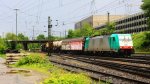 Die Cobra 2811 kommt aus Richtung Kln,Aachen-Hbf mit einem langen gemischten Gterzug aus  Kln-Gremberg nach Antwerpen-Noord(B) und fhrt in Aachen-West ein bei Sonne und Regen am 28.5.2013.